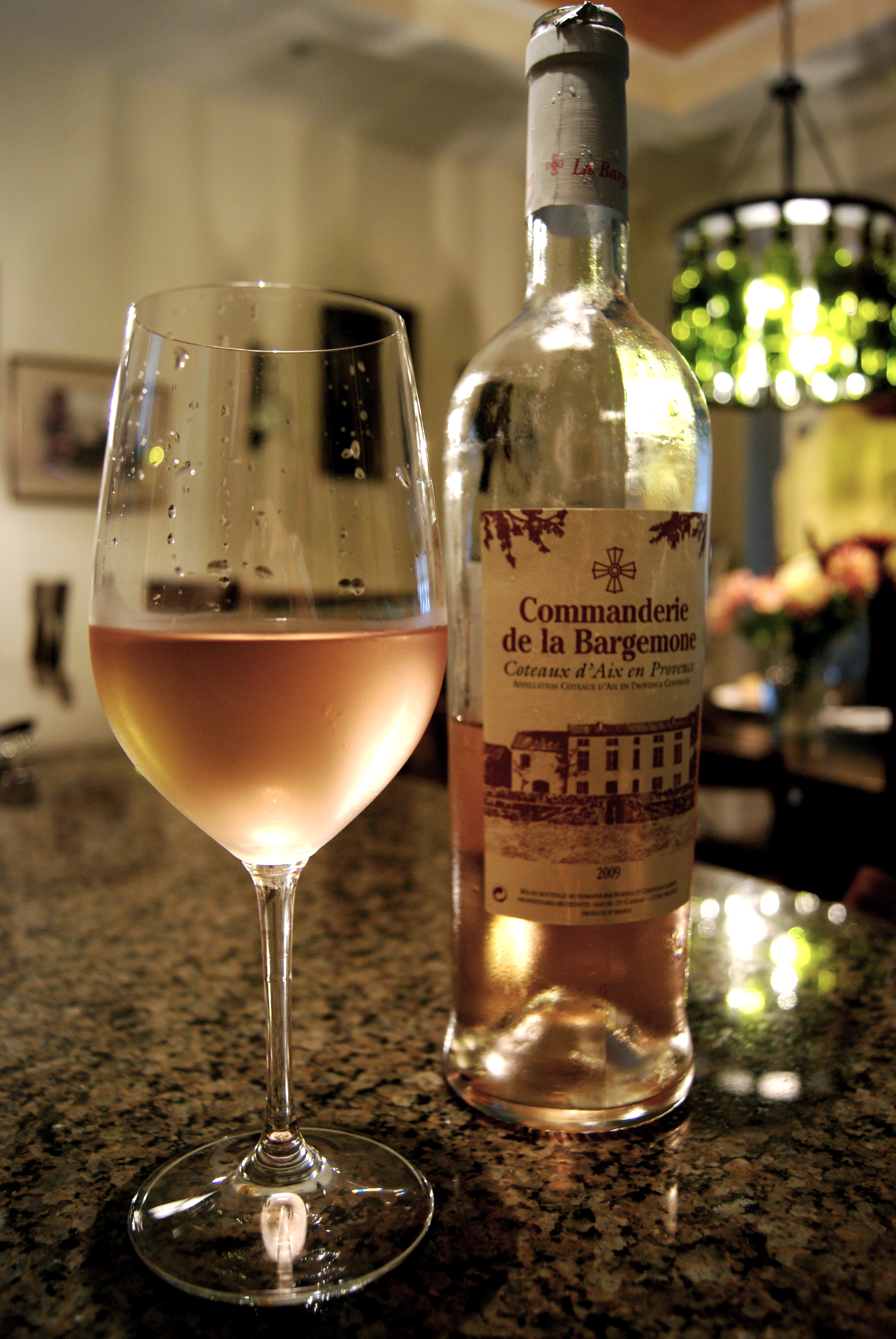 a bottle of Rose on a rainy day
