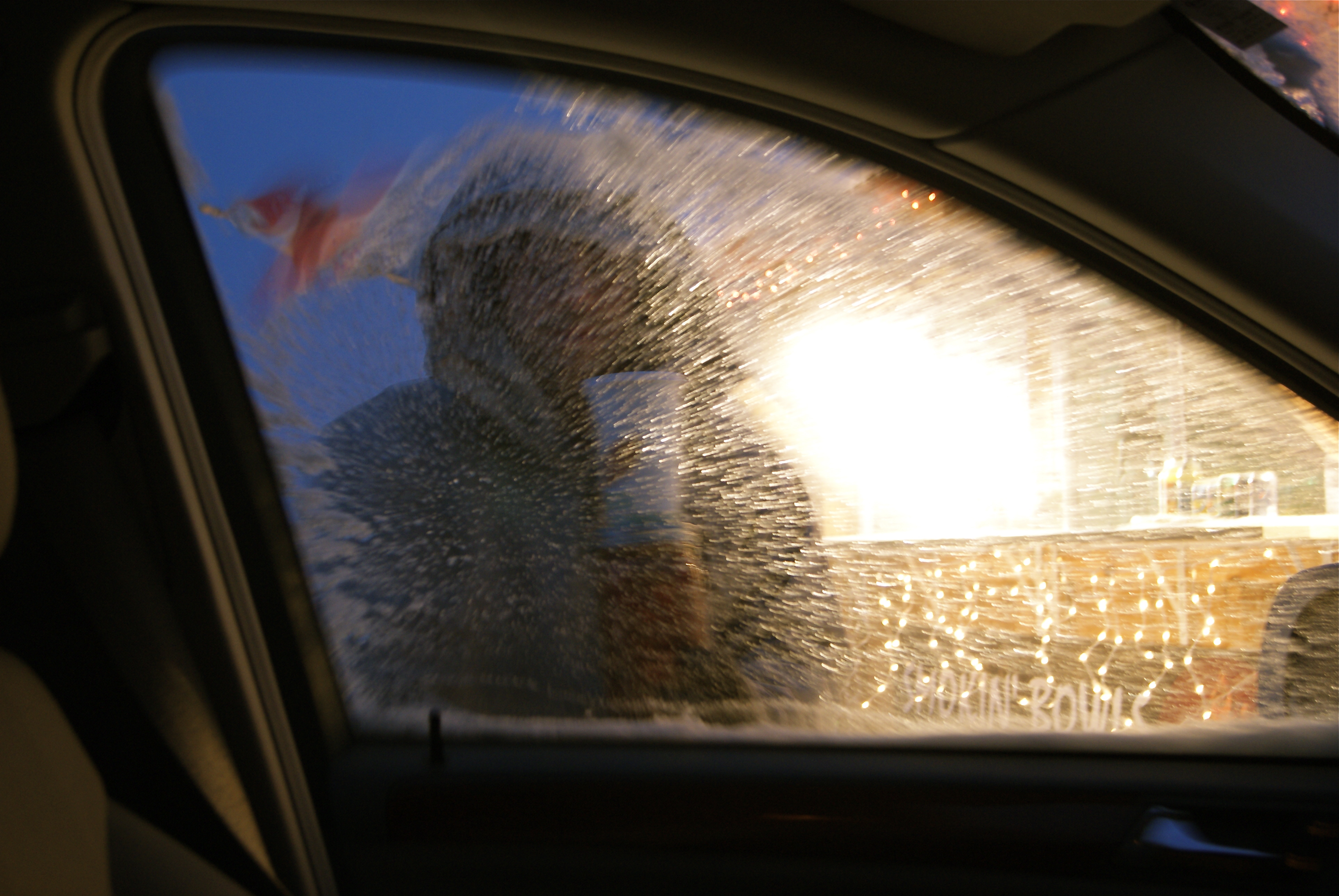 Rob getting into the icy car